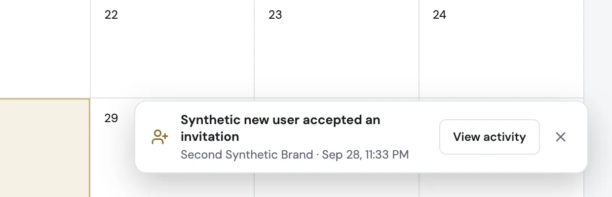 The notice up close: Synthetic new user accepted an invitation, Second Synthetic Brand, Sep 28, 11:33 PM, with View activity and a close button.